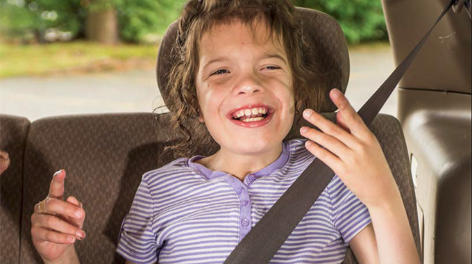 Child wearing seatbelt