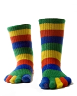 Two feet in colourful striped socks
