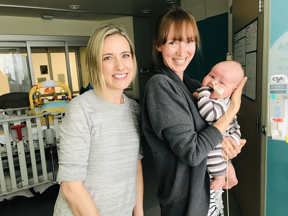 Two smiling women and baby Henry