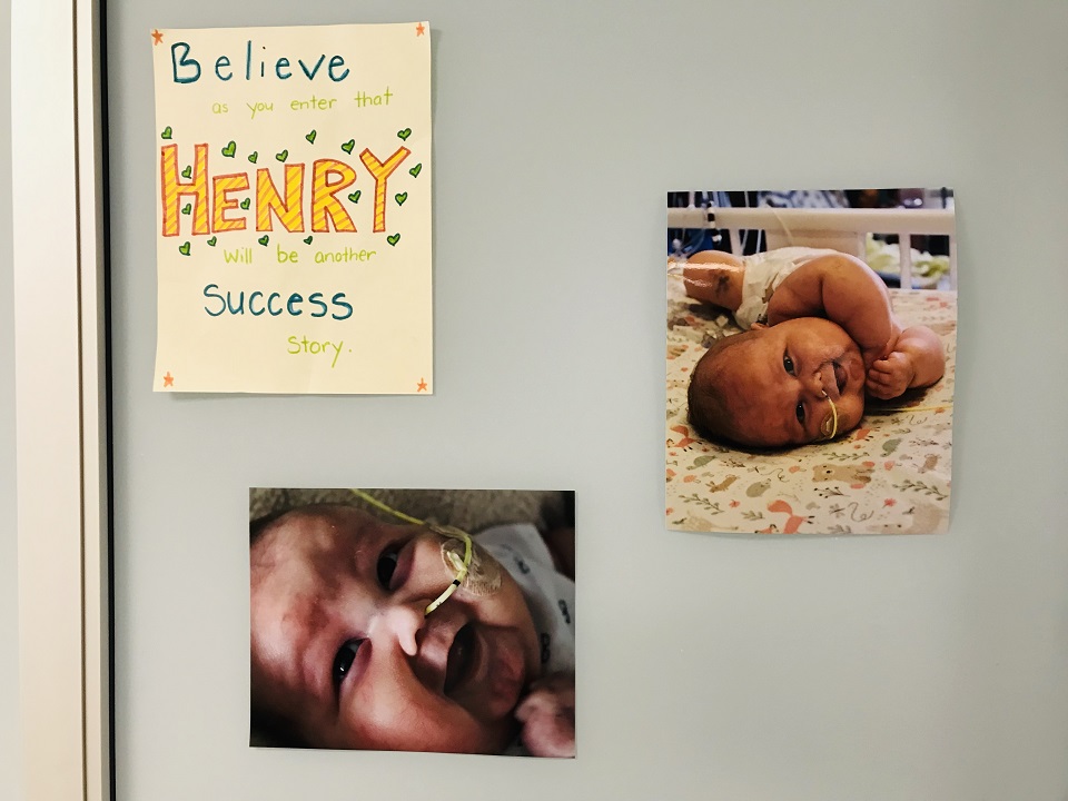 Photos and poster on Henry's hospital door