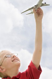 Boy with model airplane