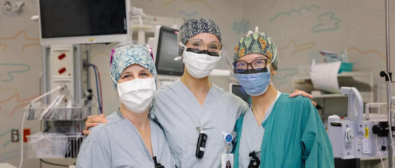 Three nurses wearing face masks