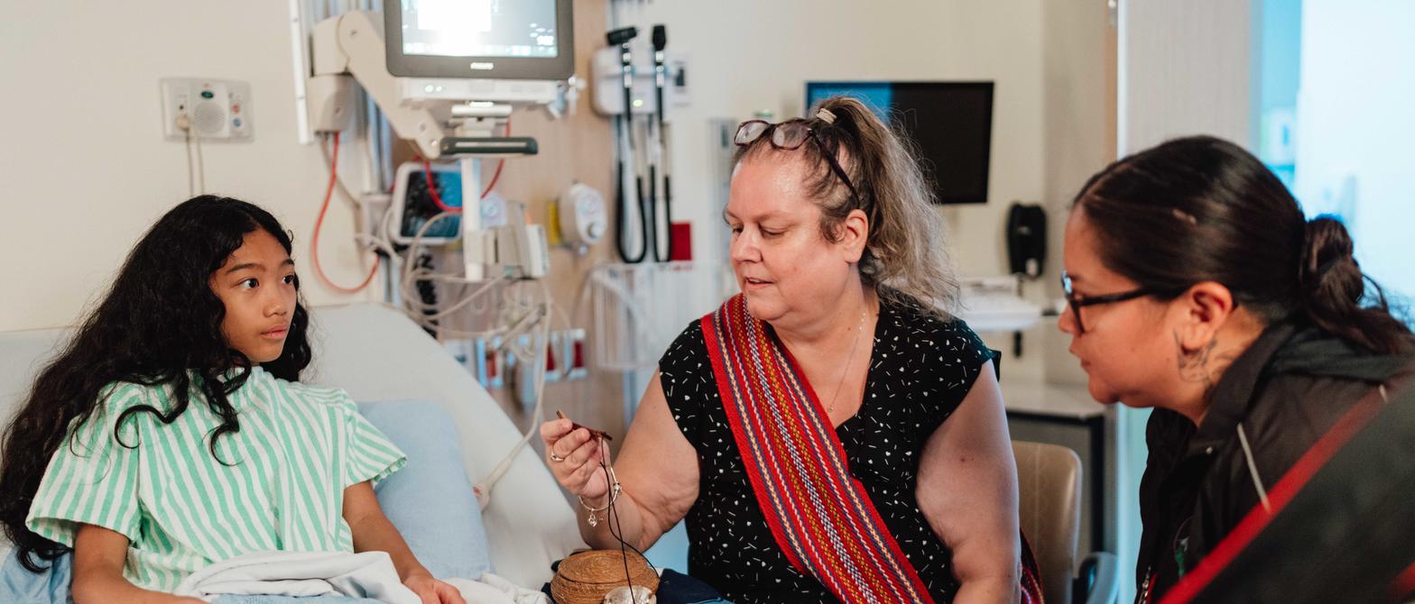 Indigenous Patient Navigators with a child patient