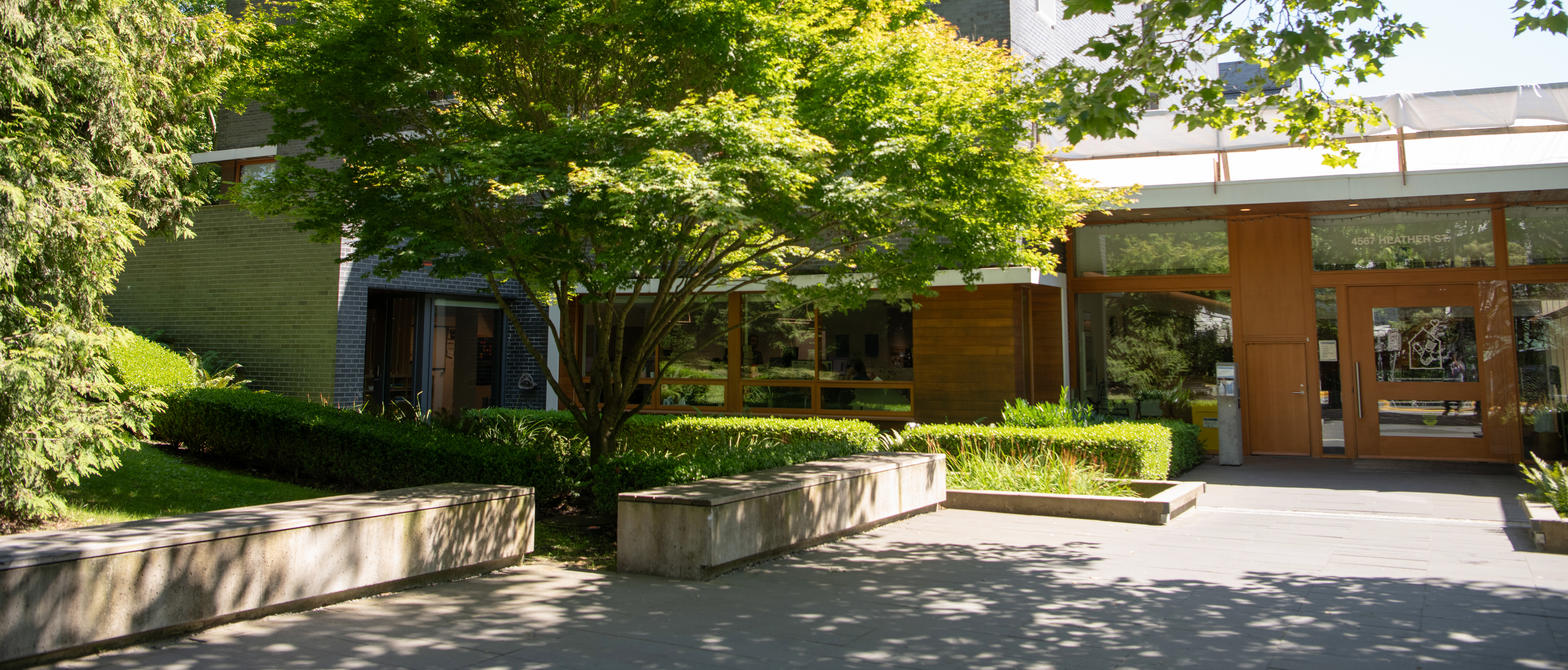 Exterior of a building with green trees outside