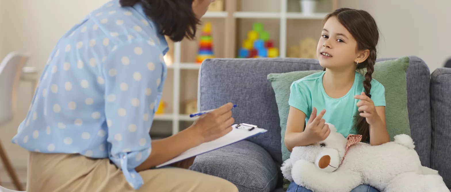 Child talking to adult