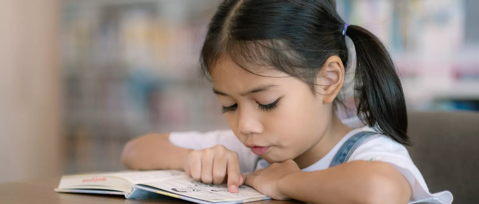 Child reading book