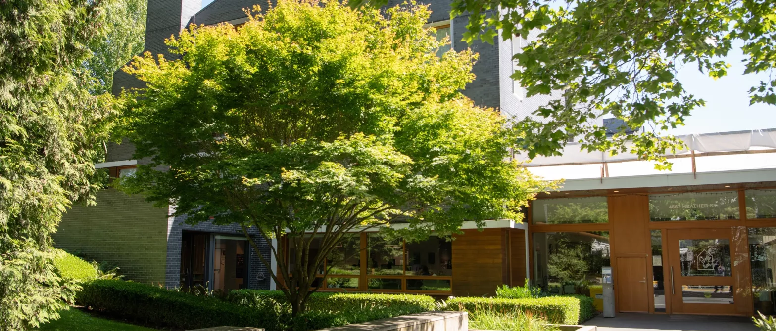 Exterior of a building with green trees outside