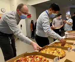 BC Children's Hospital managers getting pizza