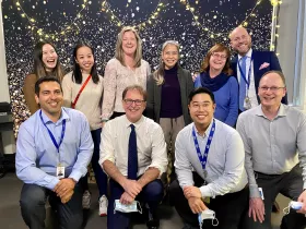 The Bill 47 team posing for a photo with Adrian Dix