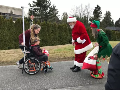 Santa meeting a patient at BC Children's hospital