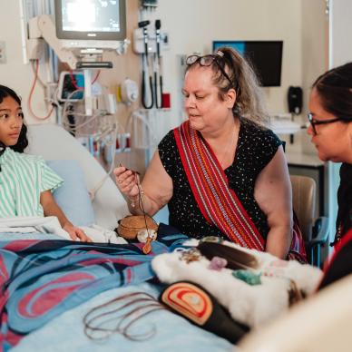 Indigenous Patient Navigators with a child patient